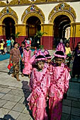 Ear piercing ceremony at Mahamuni Buddha Temple, Myanmar 